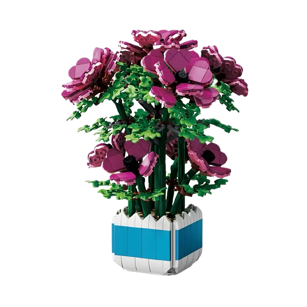 Grand bouquet magenta en briques dans un pot bleu et blanc
